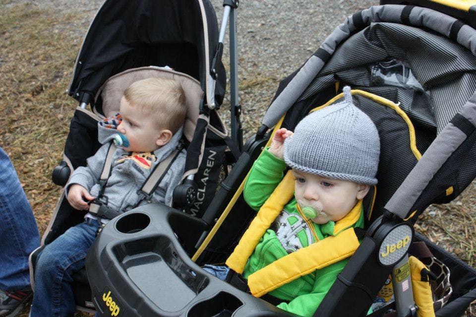 Two children in strollers