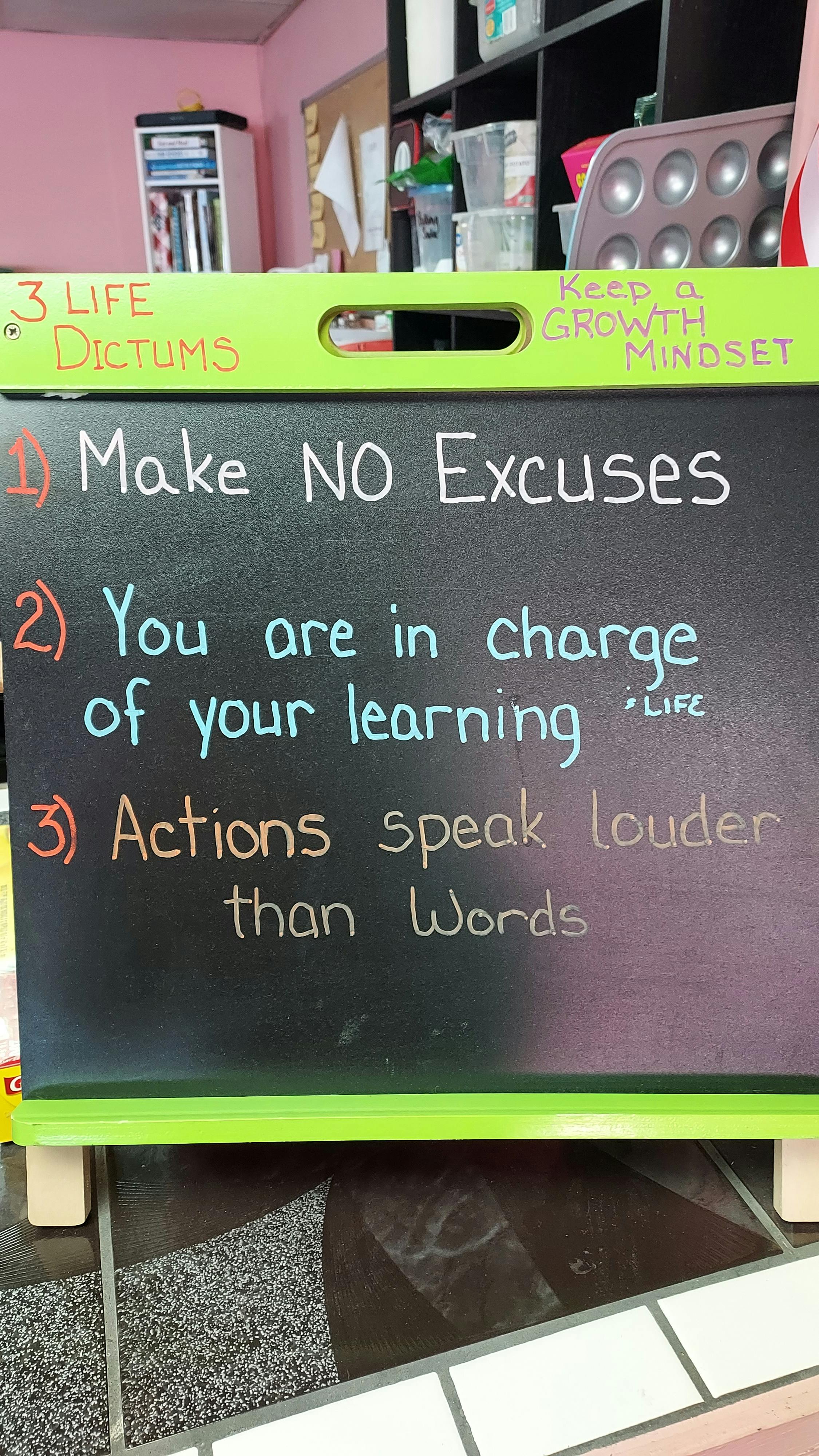 Chalkboard with "3 Life Dictums" and "Keep a Growth Mindset" written on it