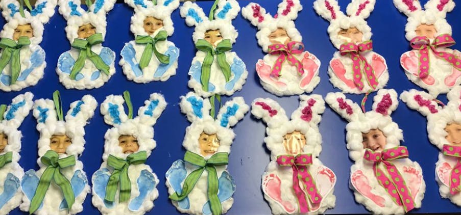 Rows of bunny-shaped decorations with doll faces and bows