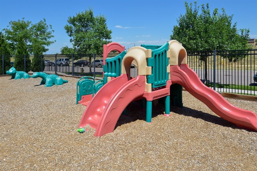 Playground with slides and climbing structures