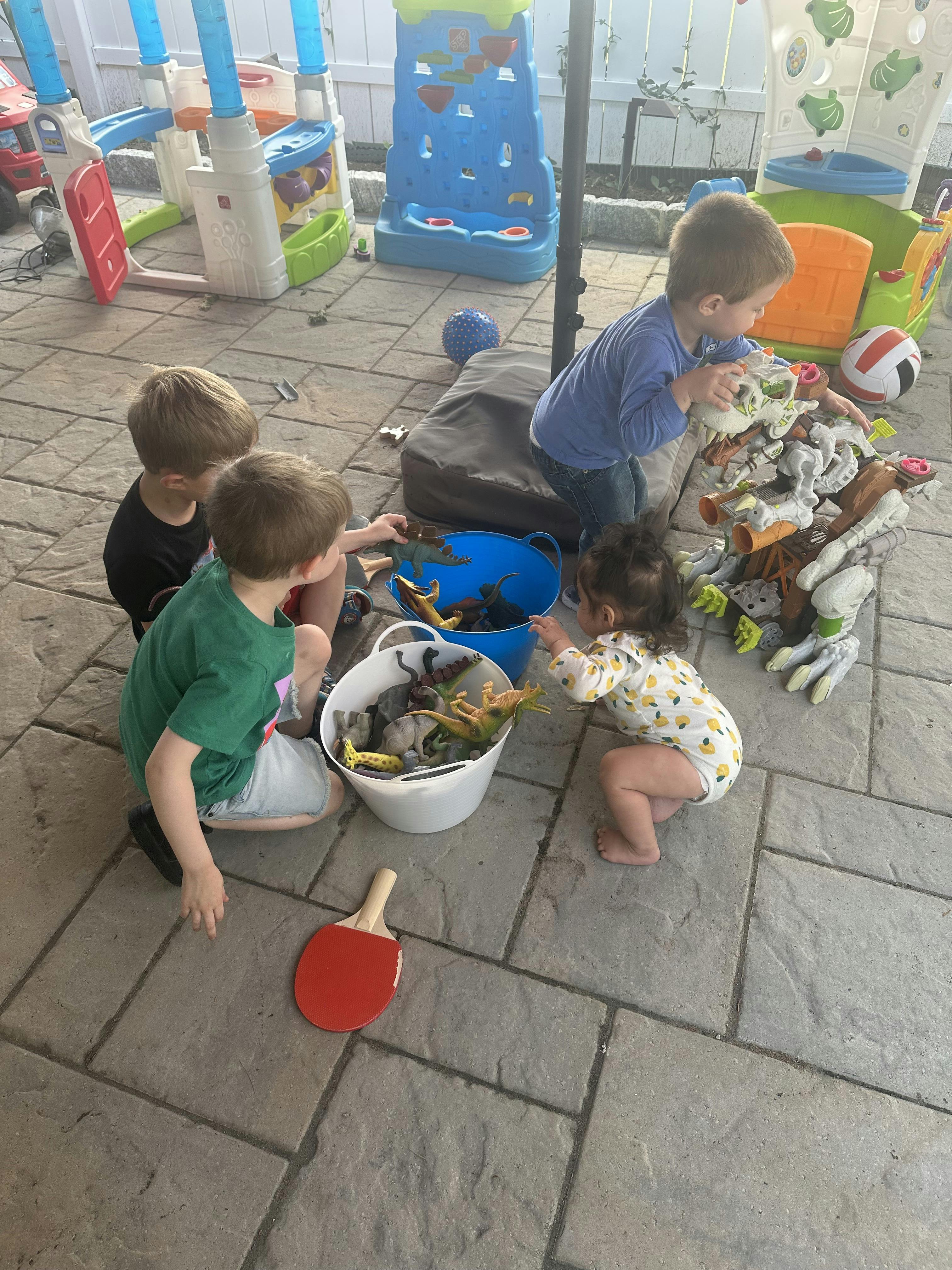 Children playing with toys outdoors