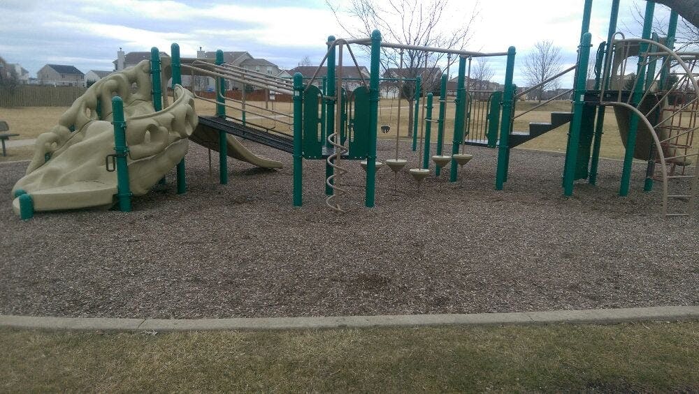Empty playground with slides and climbing structures