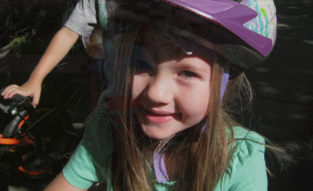 Child wearing a helmet