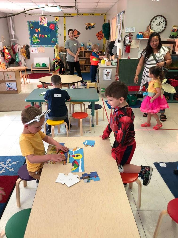 Children and adults in a classroom