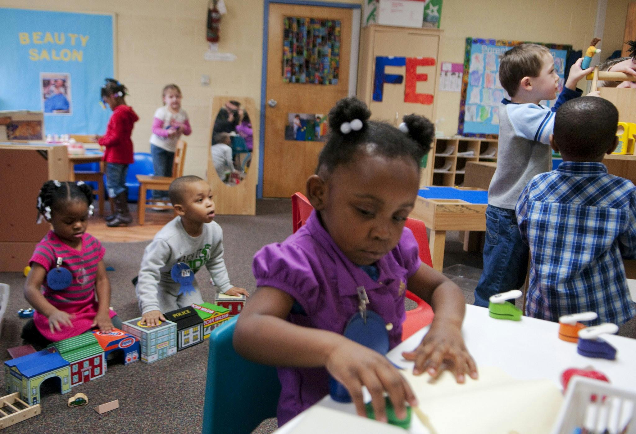 Children playing in a classroom