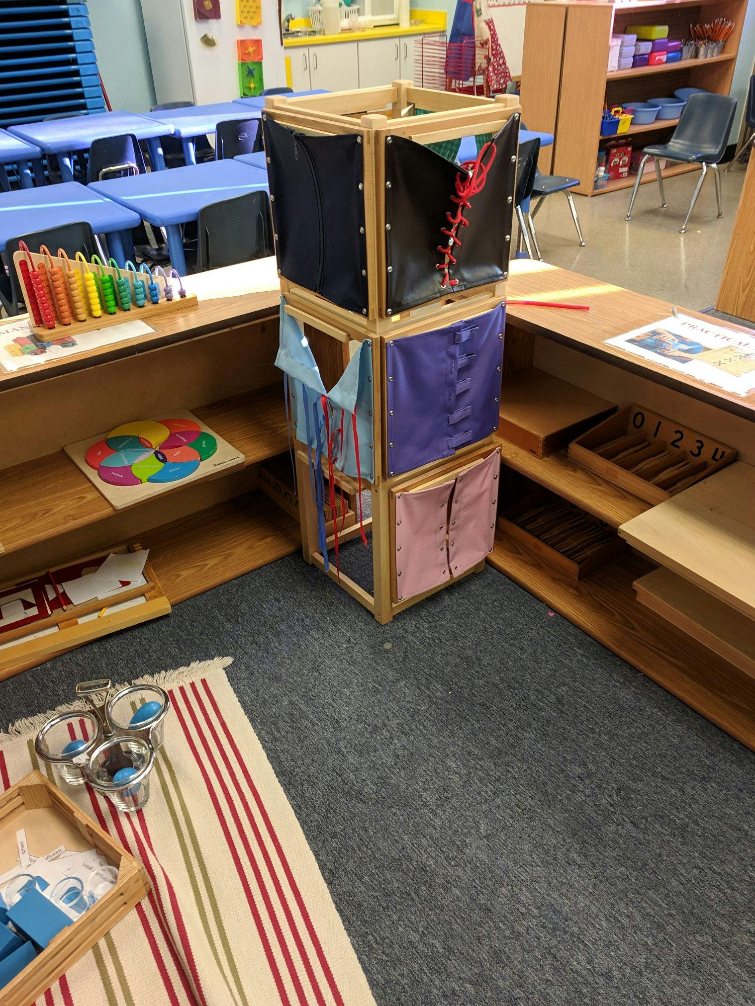 Montessori dressing frame tower in a classroom