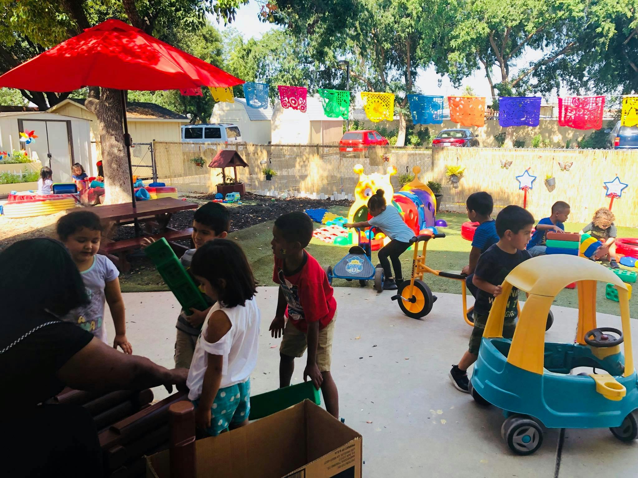 Children playing with toys outdoors
