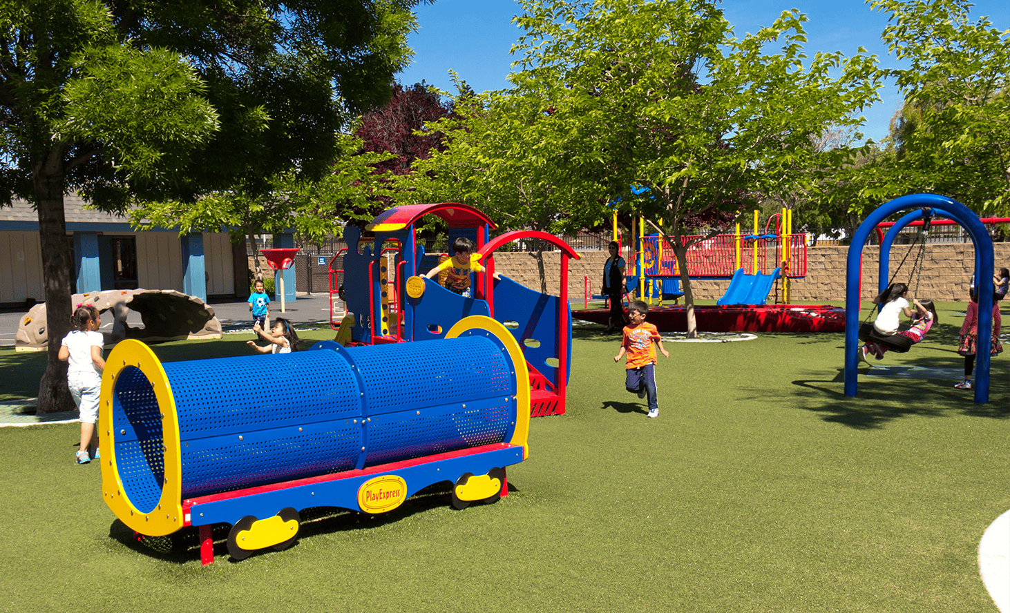 Children playing on playground equipment