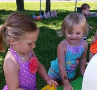 Two children playing outdoors