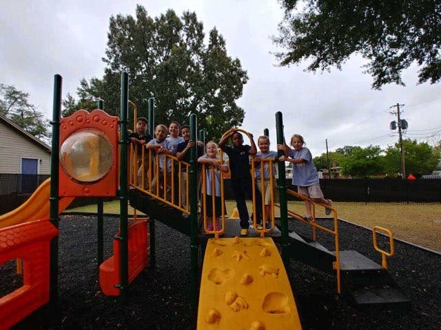 Children on a playground structure