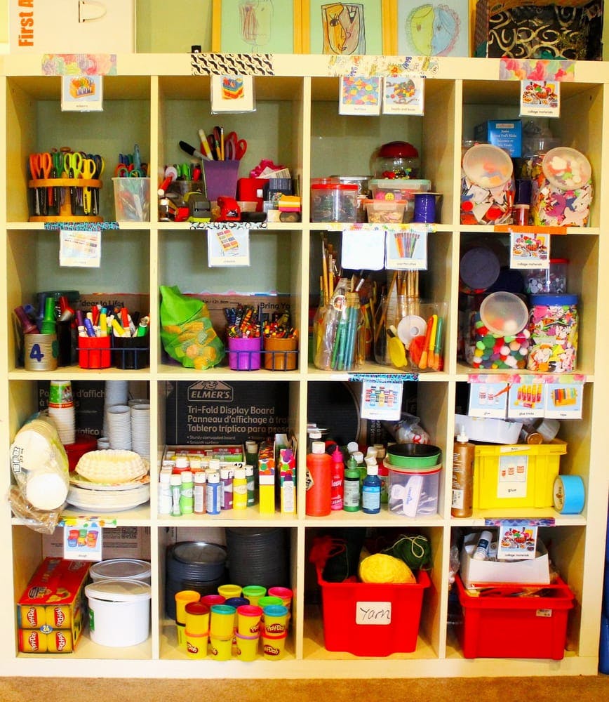 Shelves filled with art supplies and craft materials