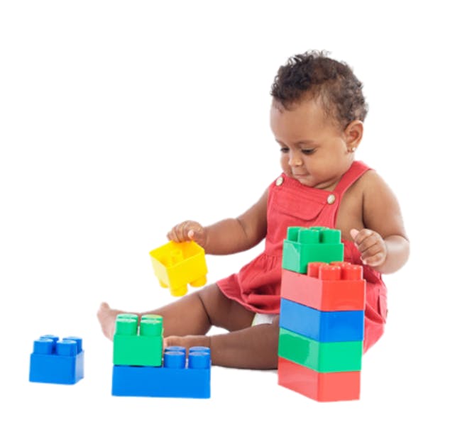 Child playing with colorful building blocks