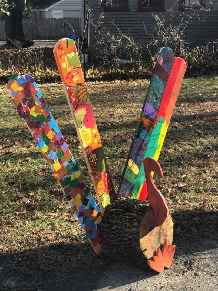 Colorful wooden turkey decoration with painted feathers