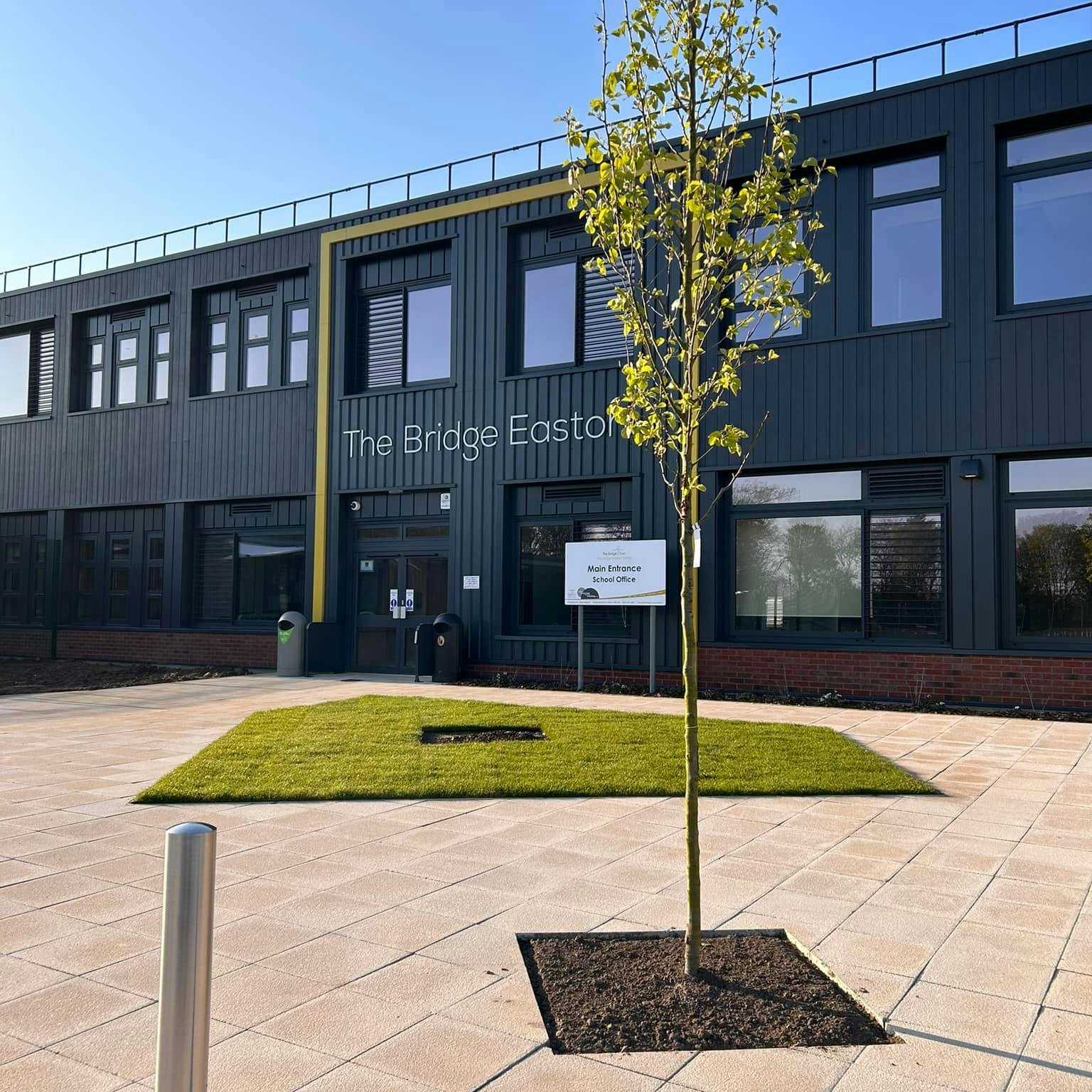 Modern building with a sign that reads "The Bridge Easton"