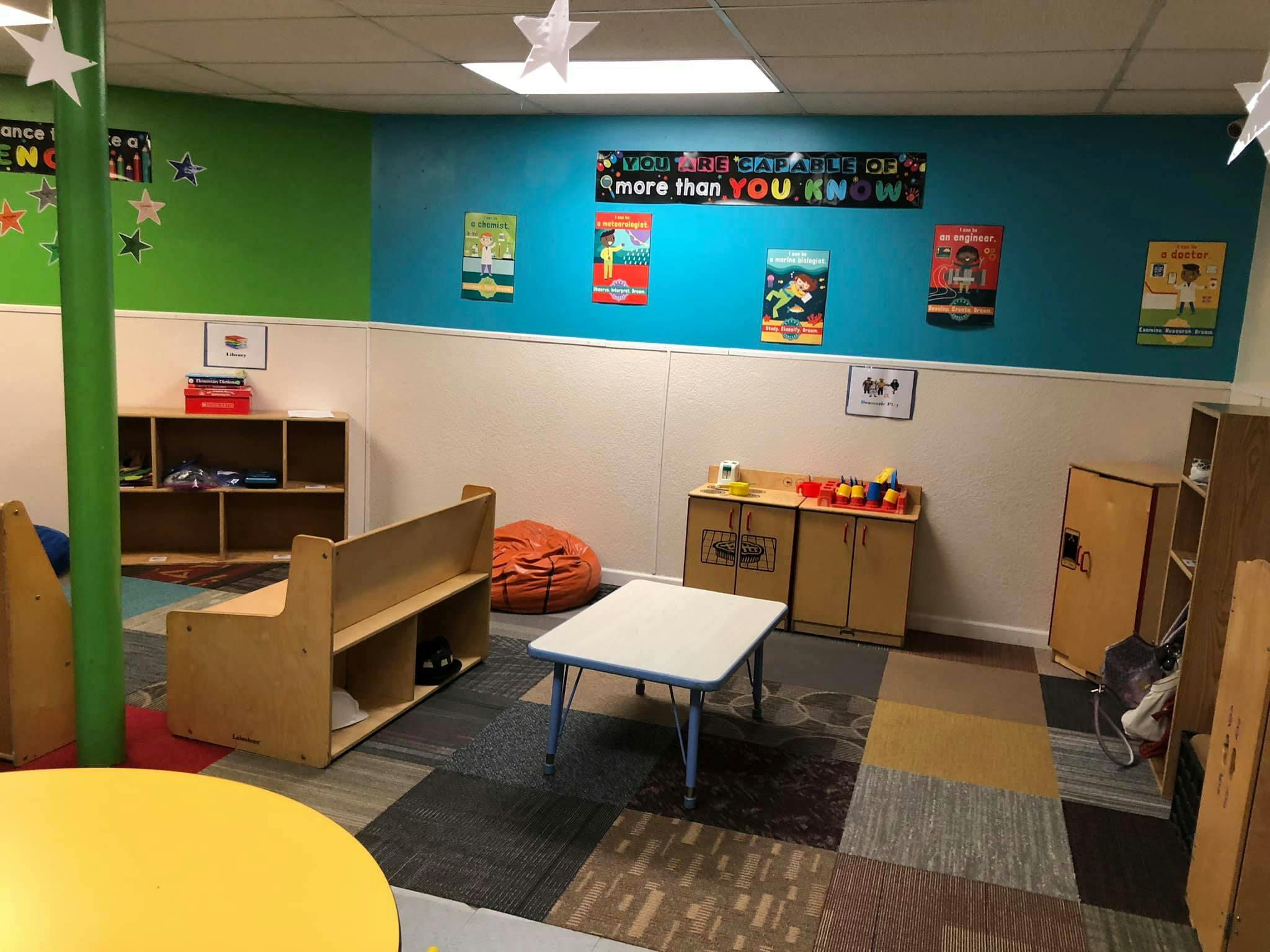 Children's classroom with small tables and chairs