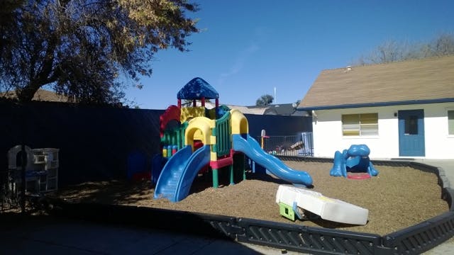 Playground with colorful slides and climbing structure