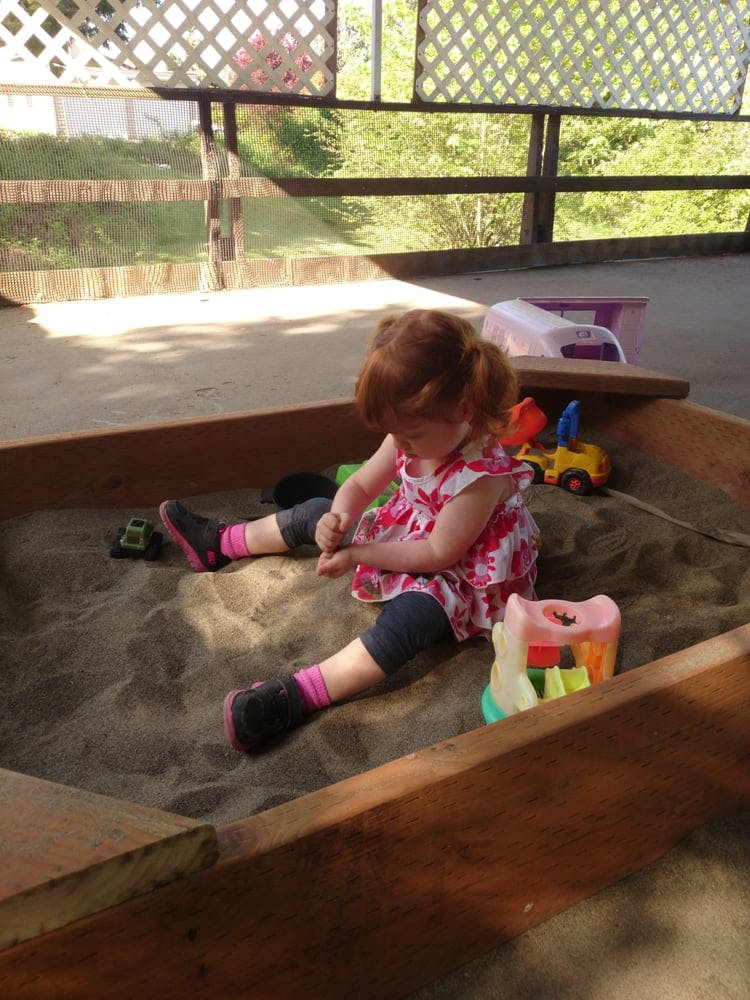 Child playing in a sandbox