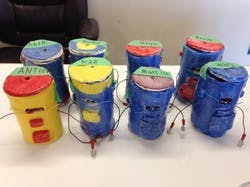 Several handmade drums with wires