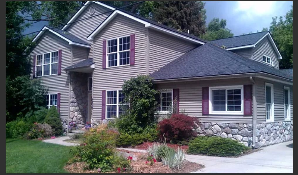 House with siding and stone facade