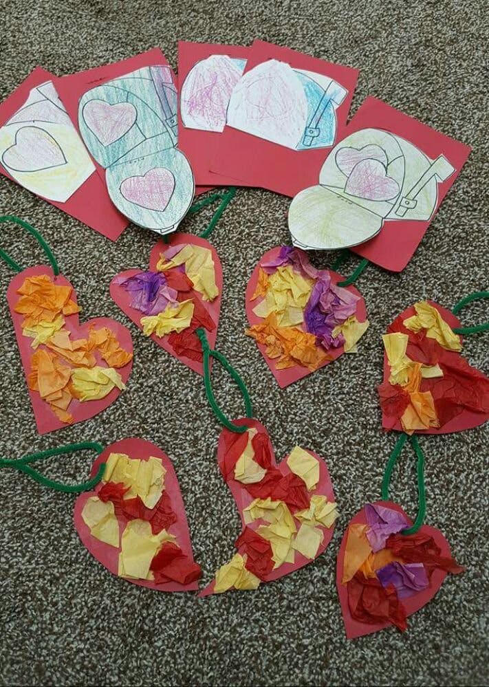 Heart-shaped paper crafts with tissue paper and drawings