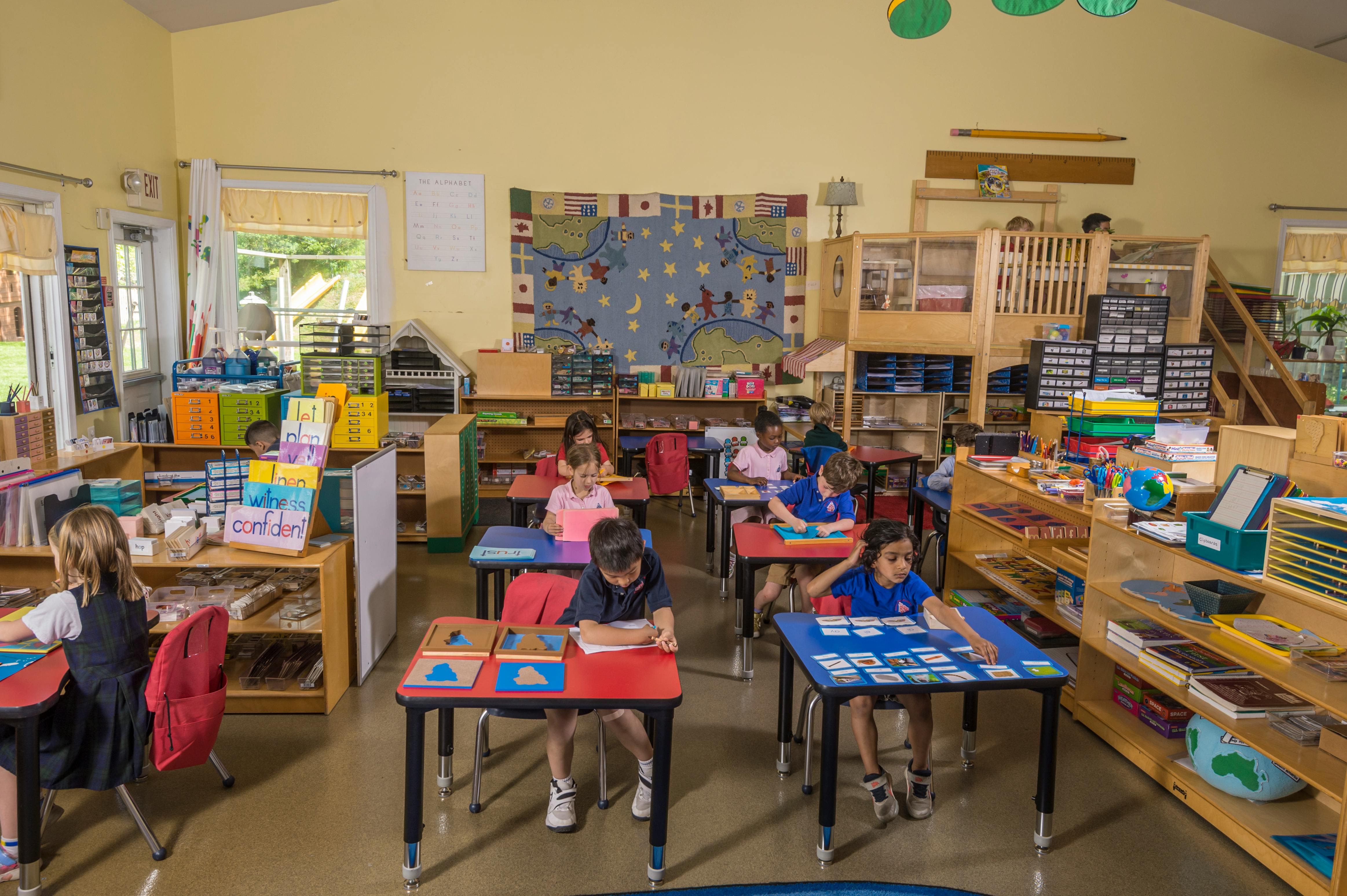 Children sitting at desks in a classroom