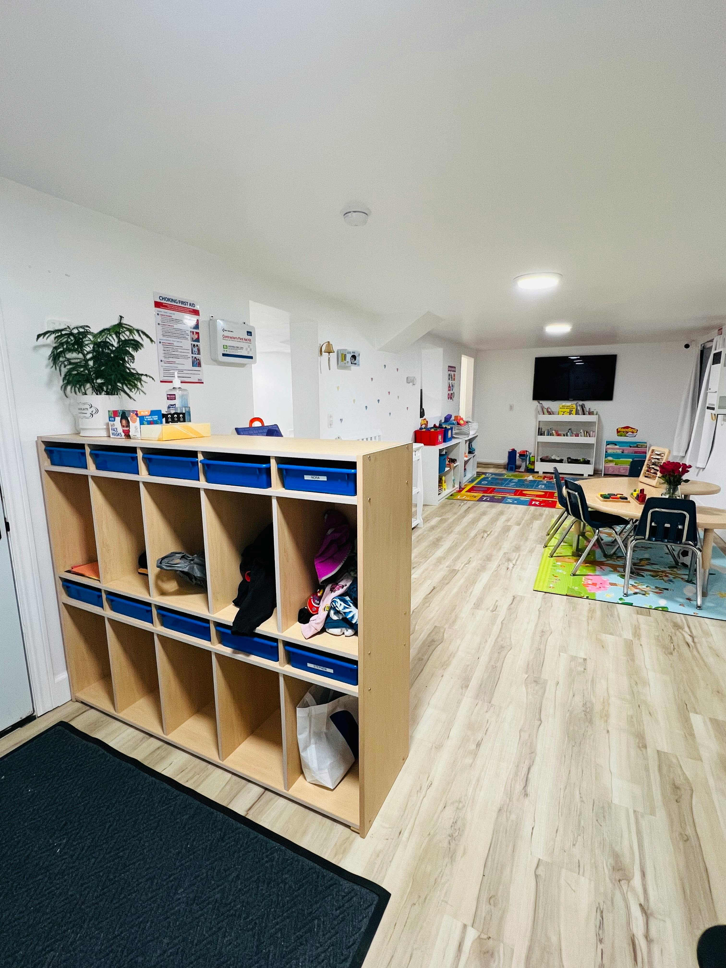 Classroom with cubbies, tables, and chairs