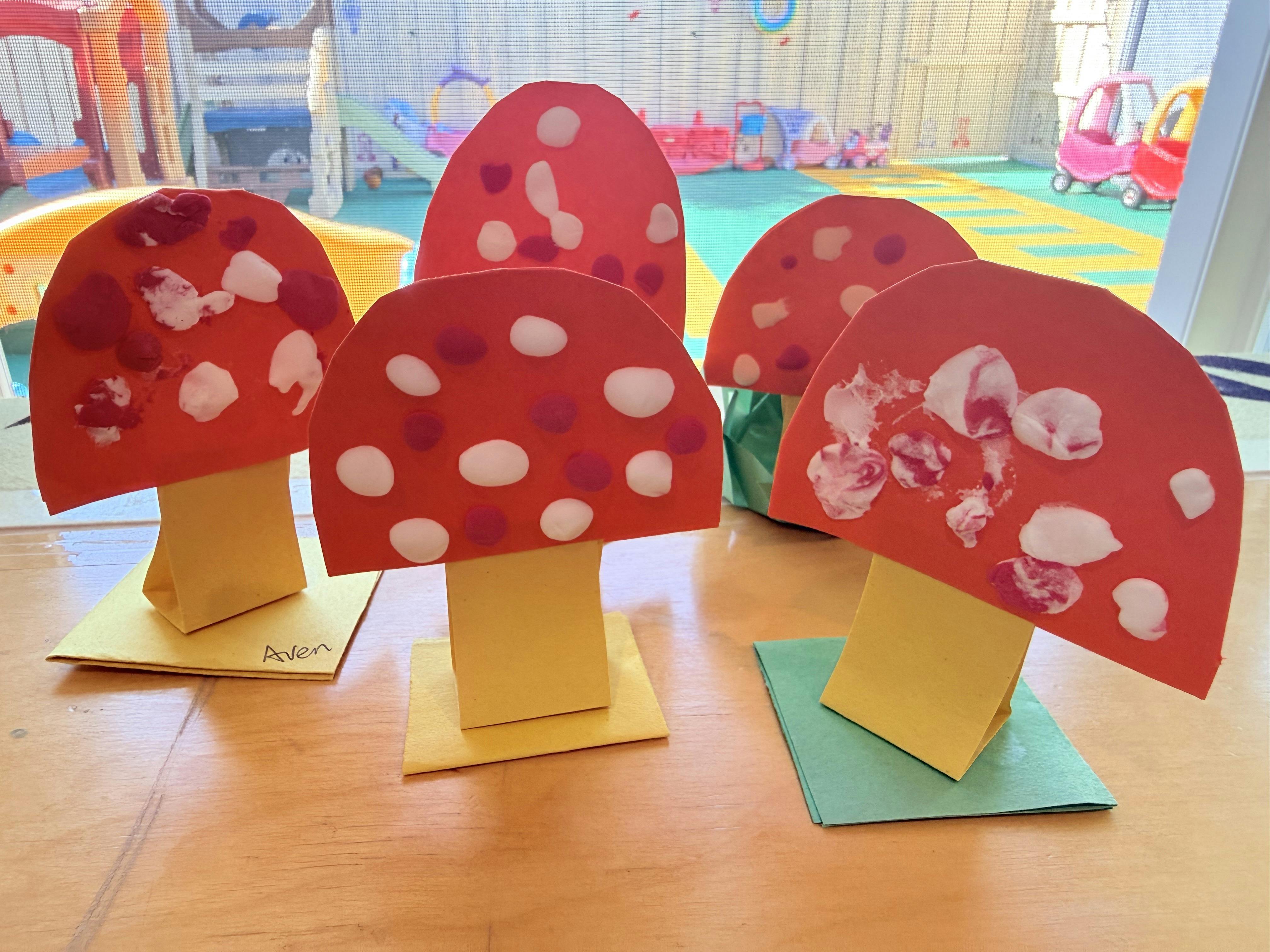 Paper mushroom crafts on a table