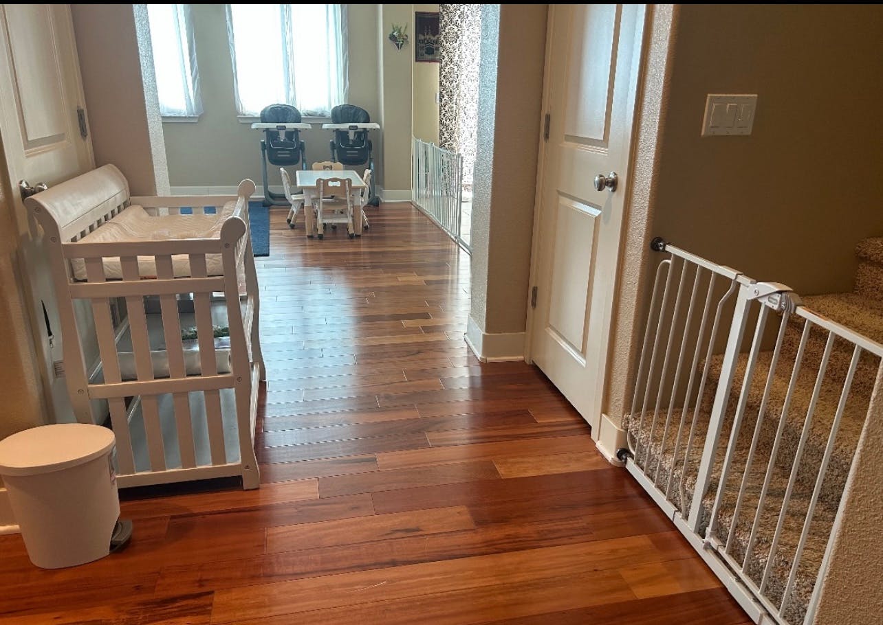 Nursery with changing table and baby gate