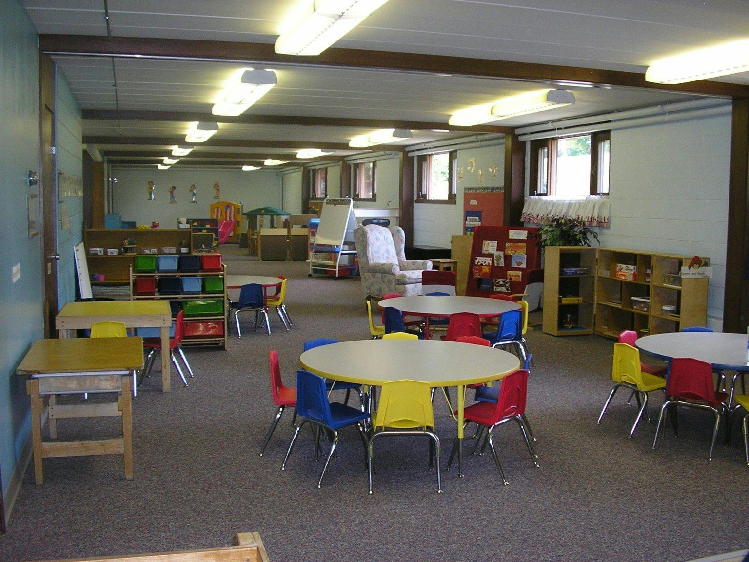 Classroom with small tables and chairs