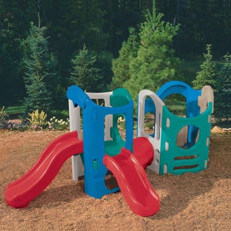 Two small plastic play structures with red slides
