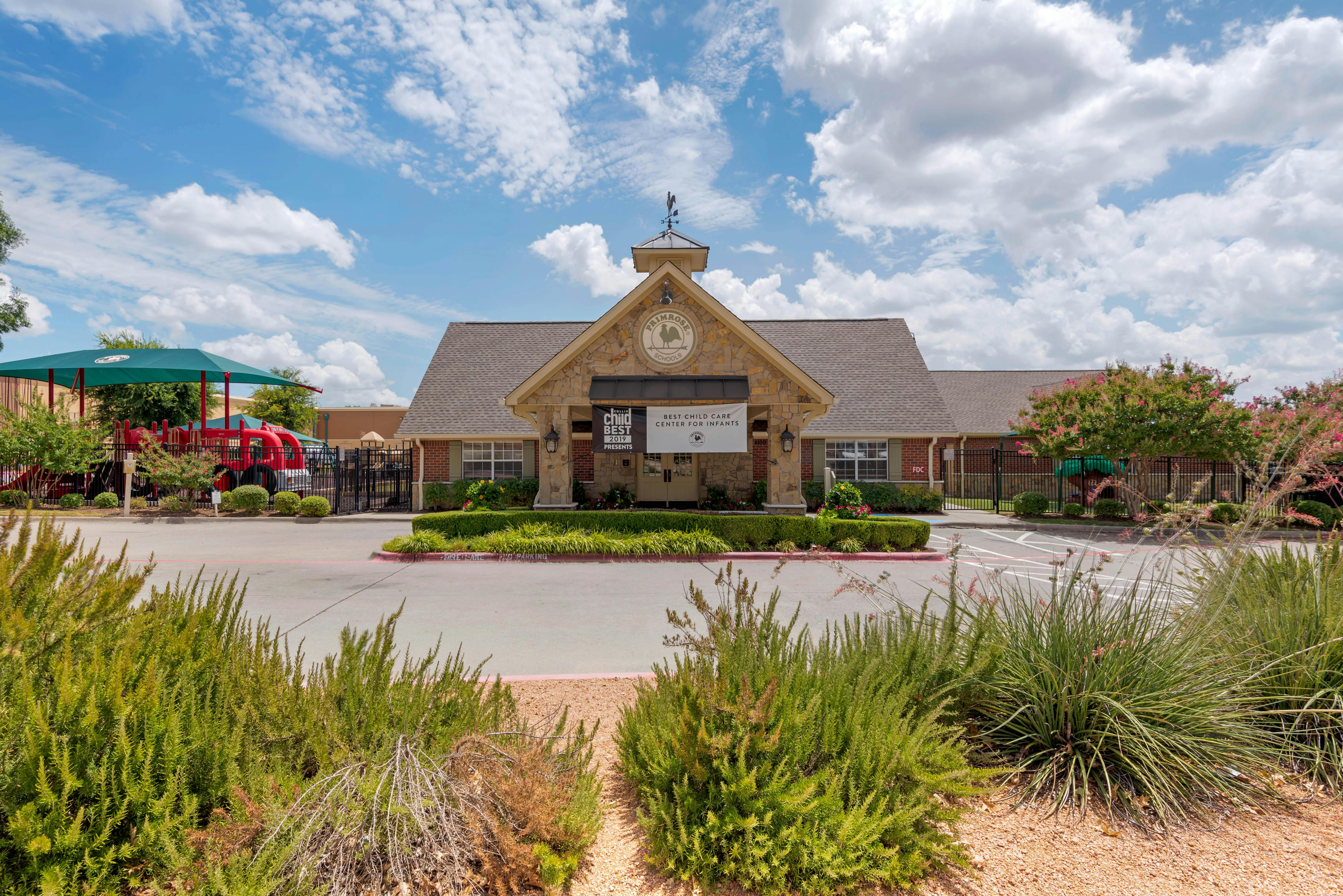 Childcare facility with a sign that reads "Best Child Care Center For Infants"