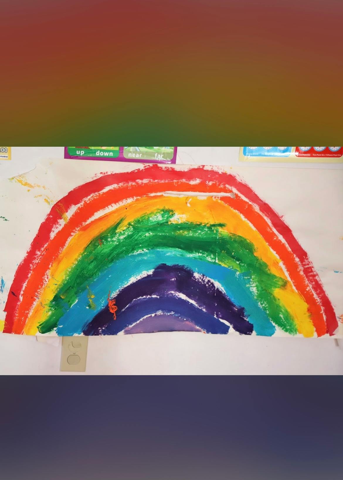 Child's painting of a rainbow
