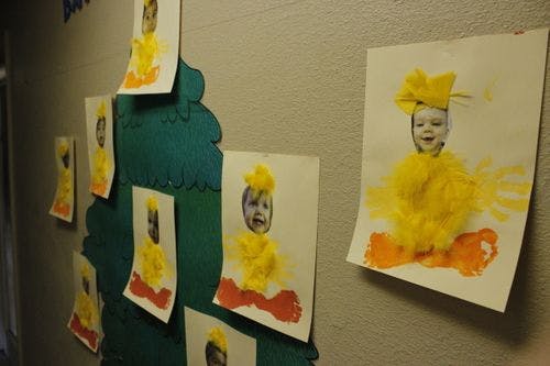 Child art projects with faces on yellow bodies