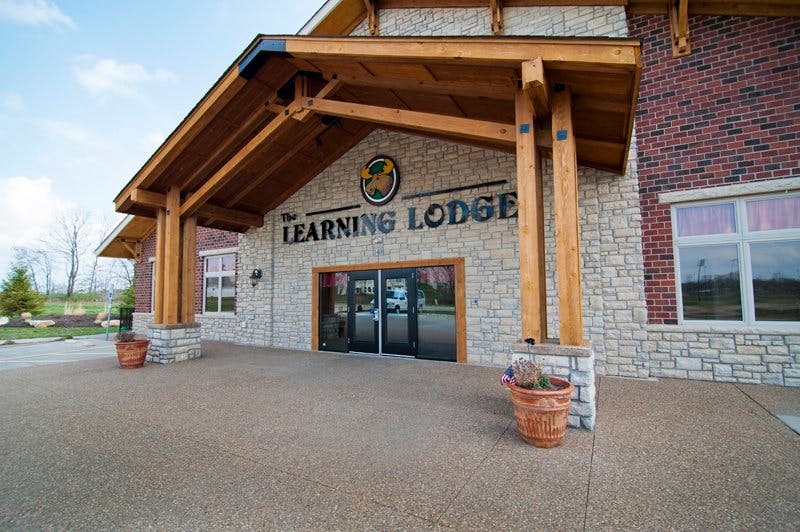 Building entrance with sign "The Learning Lodge"