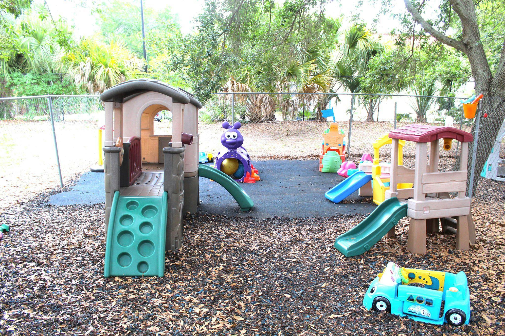 Outdoor playground with multiple slides and play structures