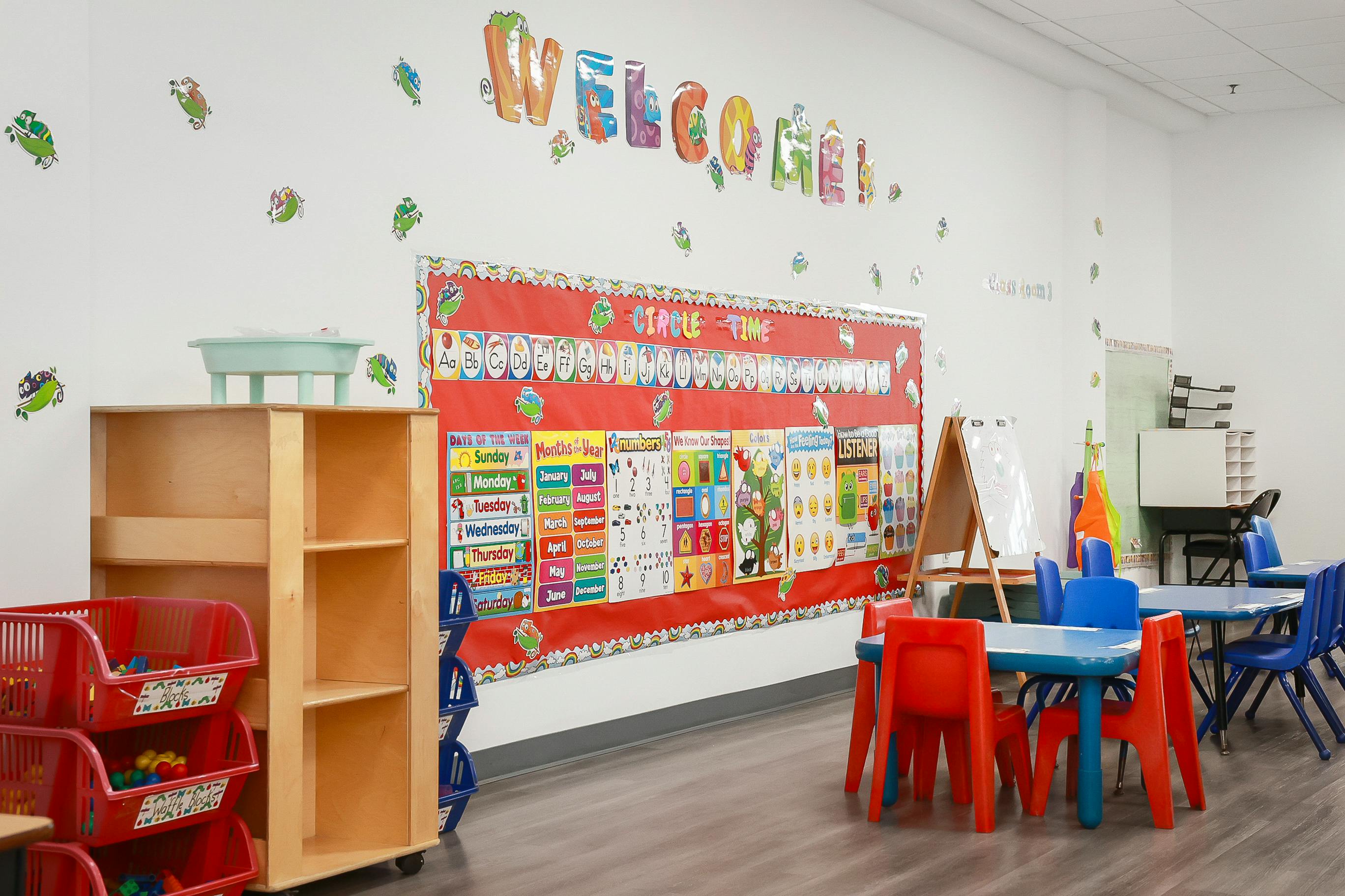 Classroom with educational wall displays and child-sized furniture