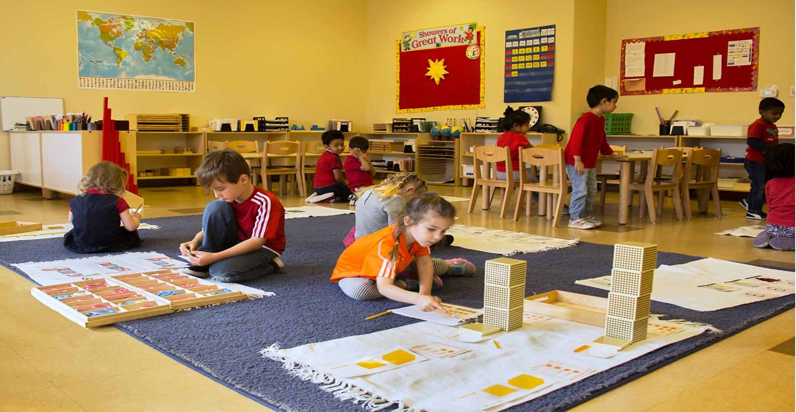 Children working on individual projects in a classroom