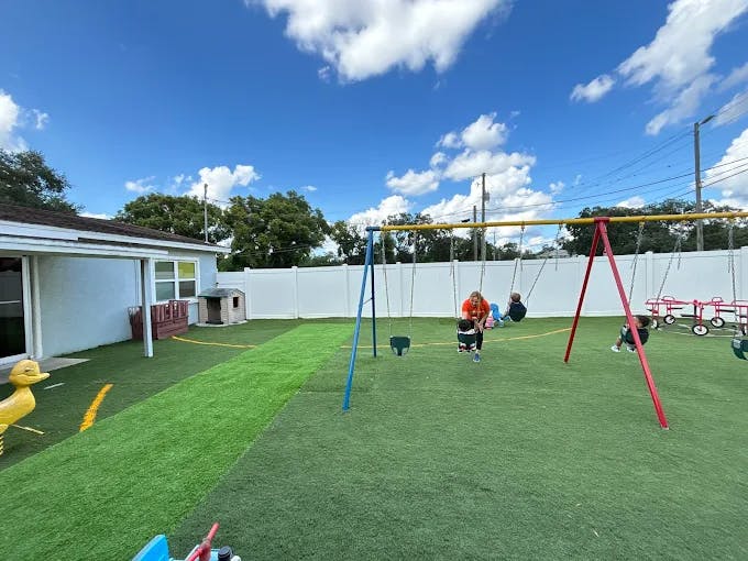 Children on swings in a playground