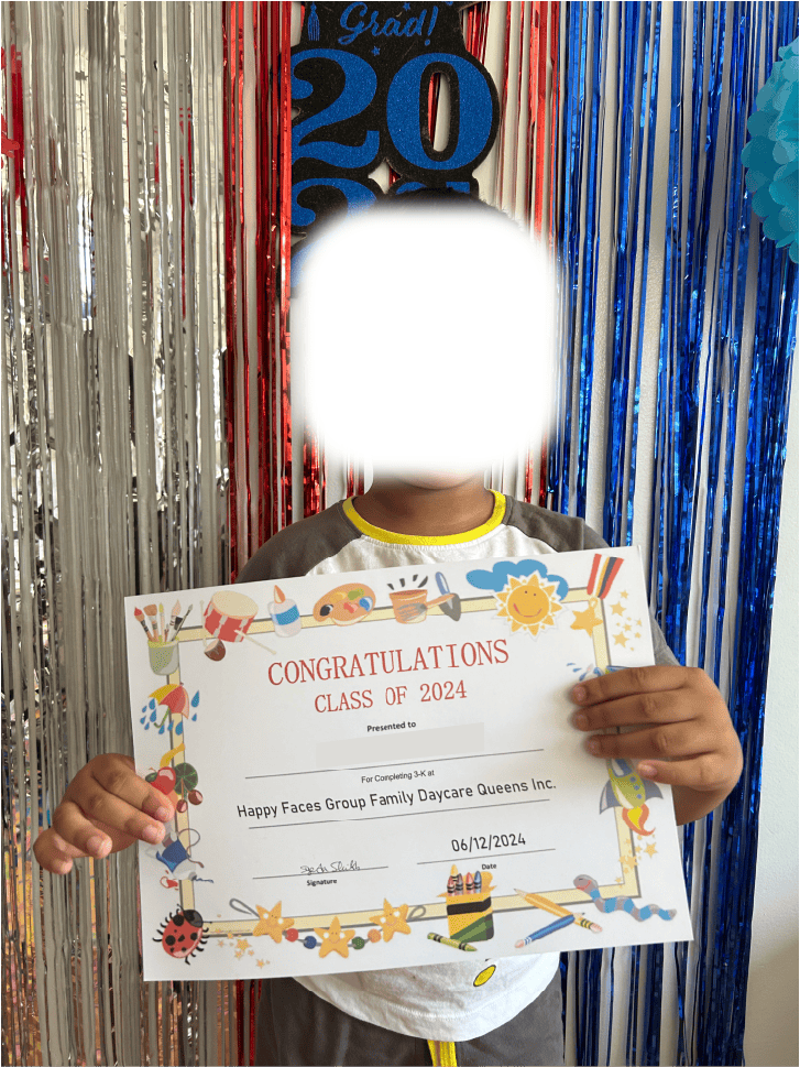 Child holding a certificate that reads "Congratulations Class of 2024"