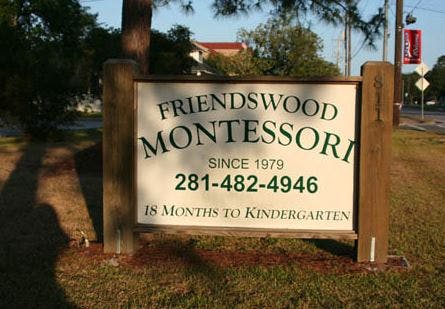 Friendswood Montessori sign with phone number and age range