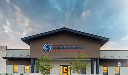 The Goddard School building exterior with sign
