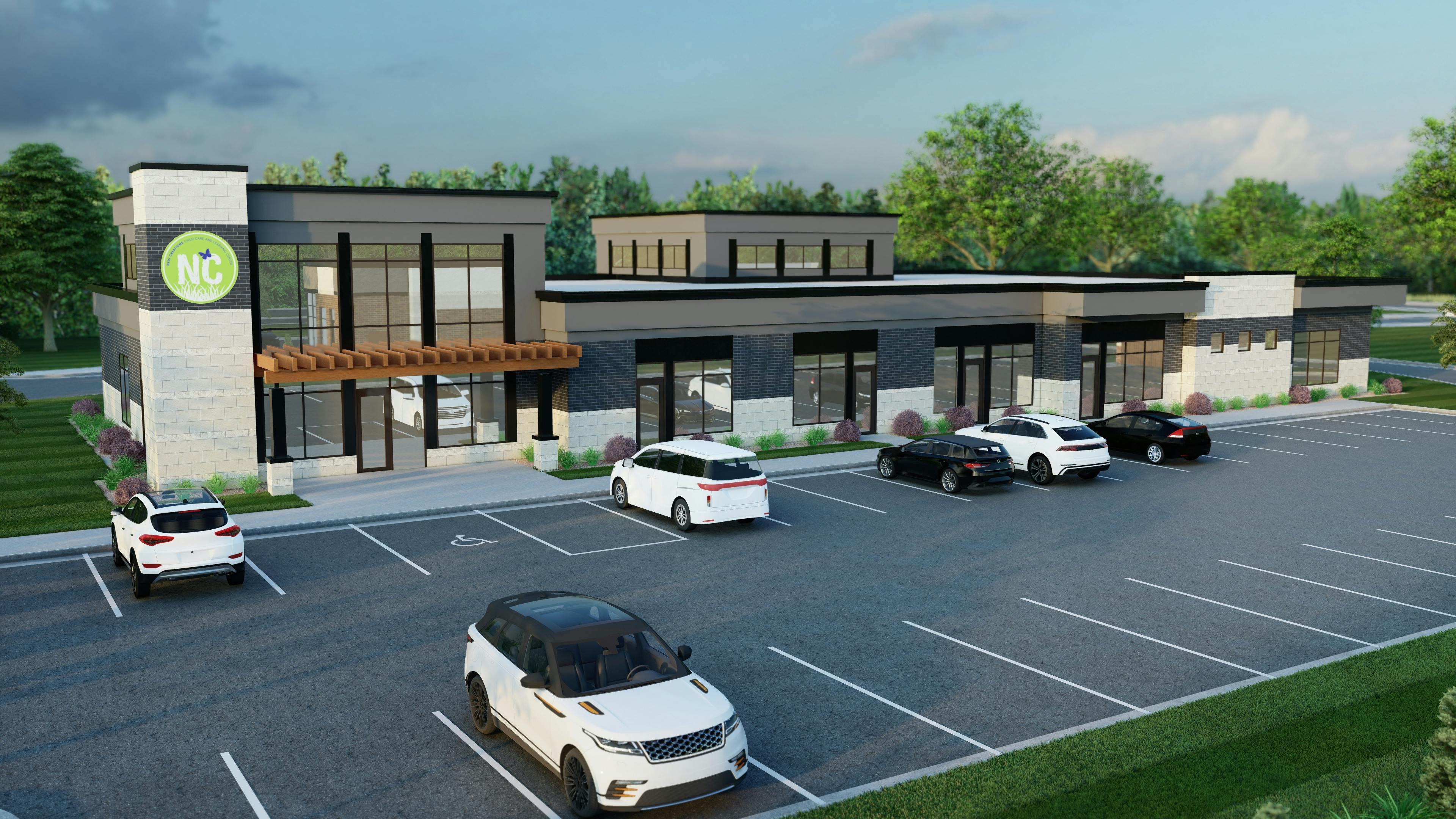 Modern building with a parking lot and several cars