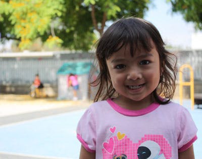 Child smiling at the camera