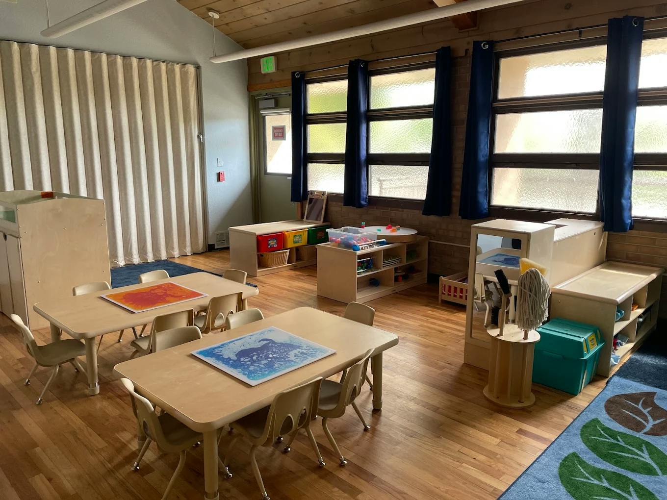 Classroom interior with small tables and chairs for children