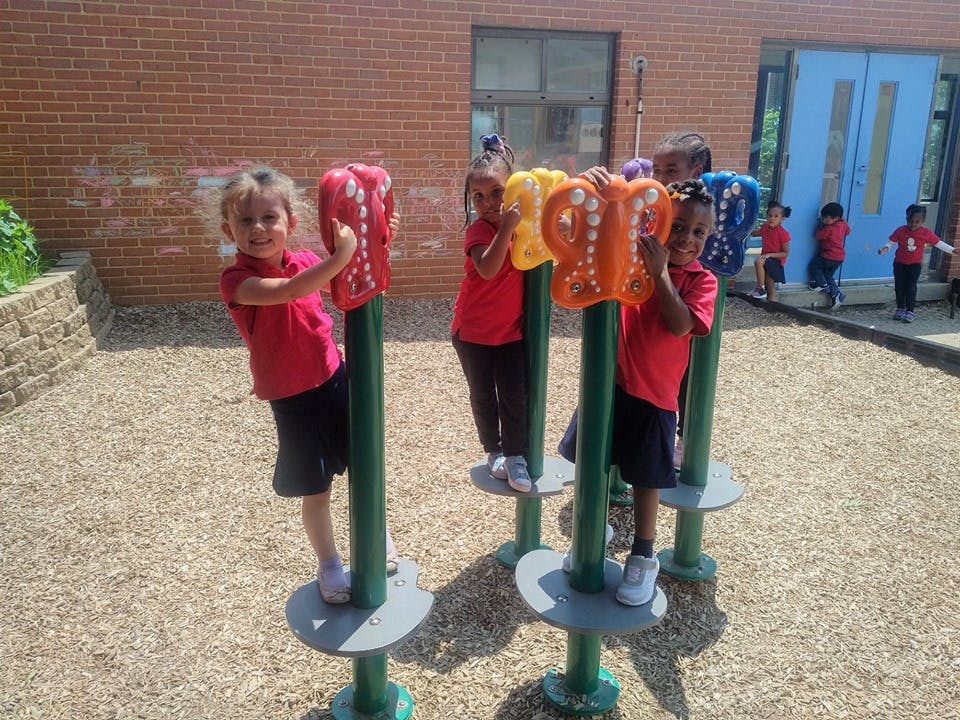 Children playing on playground equipment