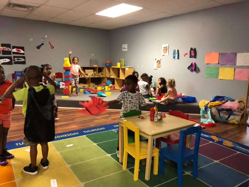 Children playing in a classroom