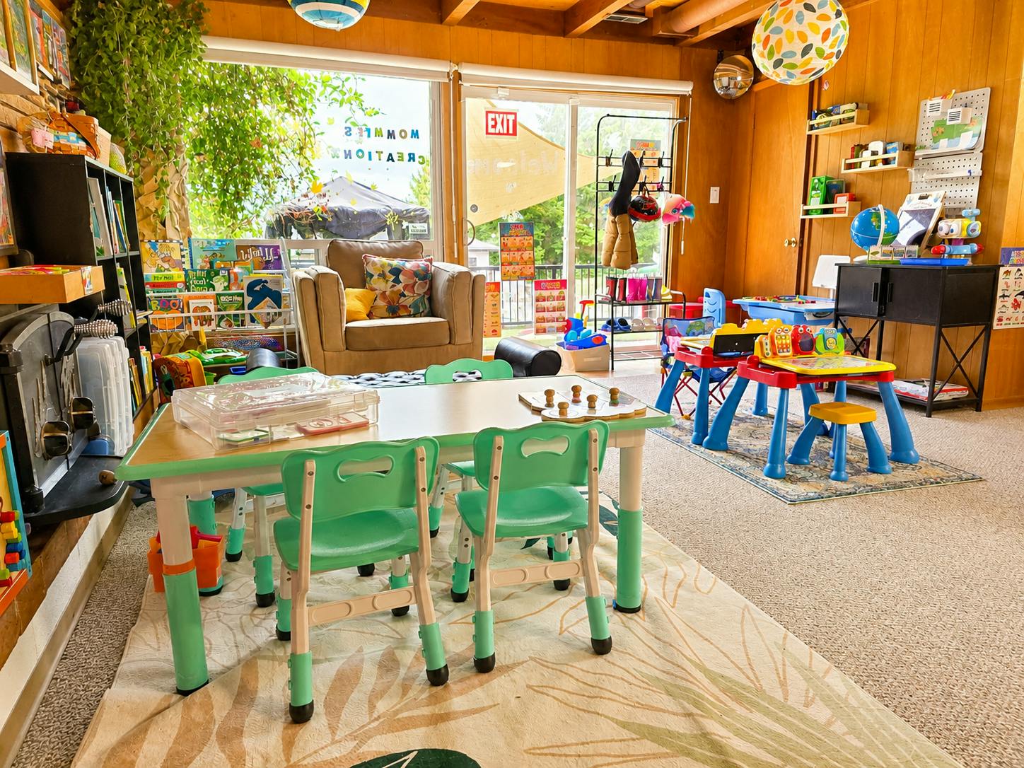 Child sized tables and chairs in a play area