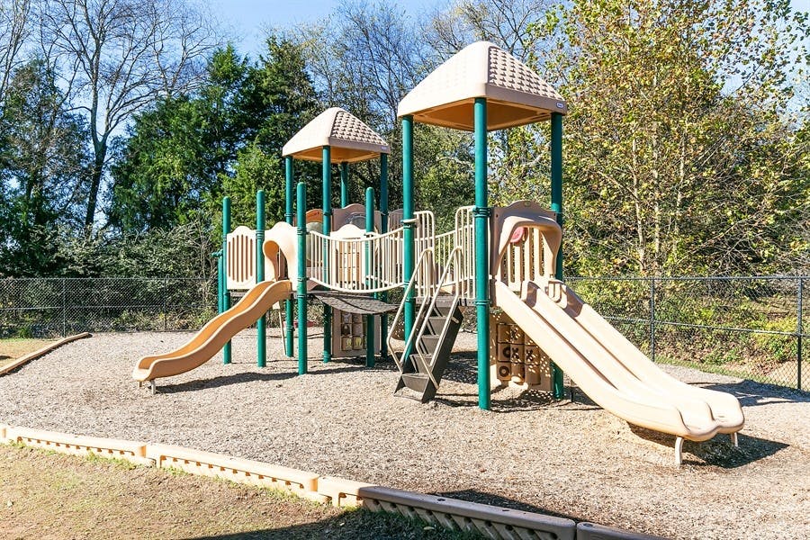 Playground with slides and climbing structures