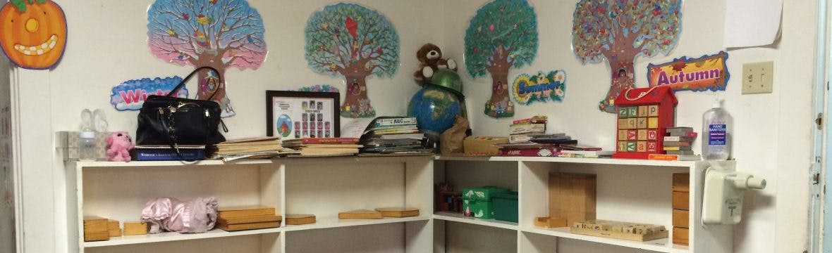 Shelves with various items and wall decorations in a room