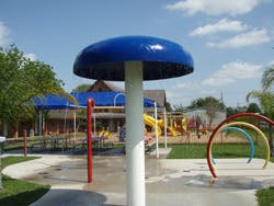 Water mushroom feature at a splash pad
